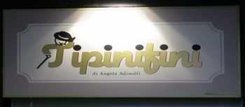 Logo Tipinifini abbigliamento bambini Genova